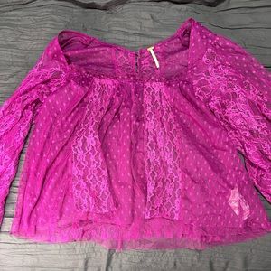 Free people lace top button back. Never worn.  Size can
